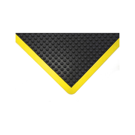 Tapis antifatigue à surface texturée