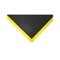 Anti-fatigue mat with textured surface