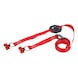 Holder for traffic cone using lashing strap with clamping lock - 1